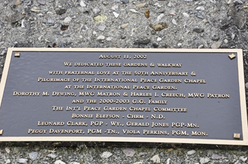 dedication sign for the gardens and walkway at International Peace Garden